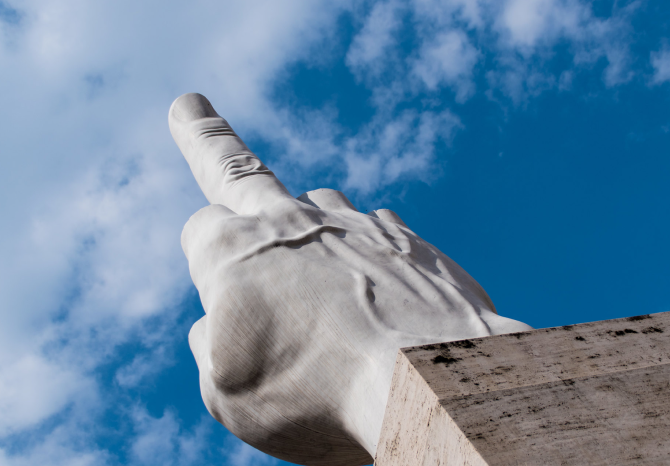 Maurizio Cattelan's 11-meter marble statue of a middle finger at Milan's stock exchange